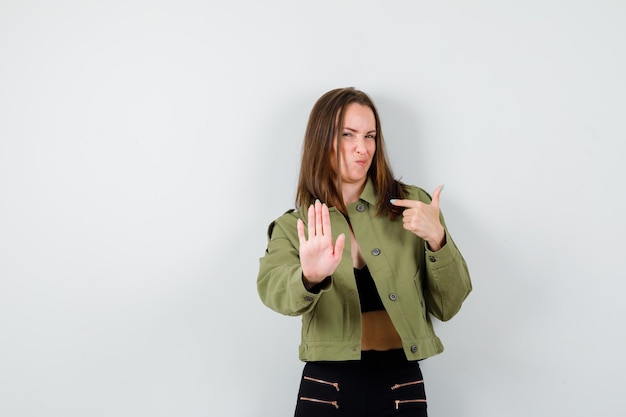 Expressive young girl posing in the studio