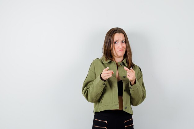 Expressive young girl posing in the studio