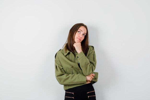 Expressive young girl posing in the studio