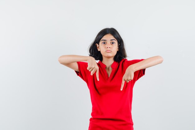 Expressive young girl posing in the studio