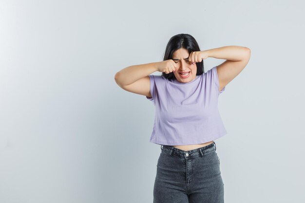 Expressive young girl posing in the studio