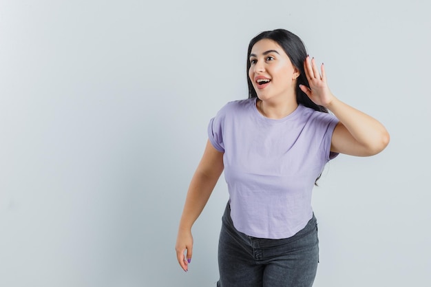 Expressive young girl posing in the studio