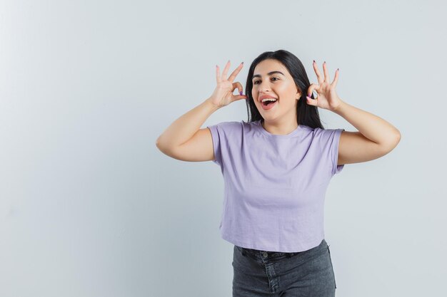 Expressive young girl posing in the studio