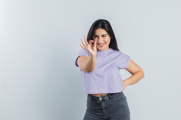 Expressive young girl posing in the studio