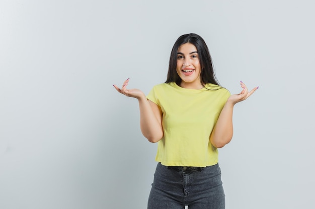 Expressive young girl posing in the studio