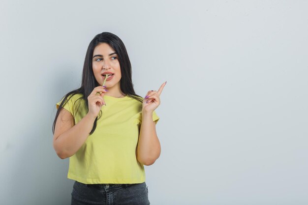 Expressive young girl posing in the studio