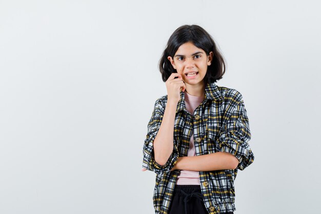 Expressive young girl posing