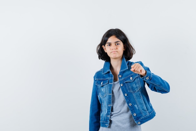 Expressive young girl posing