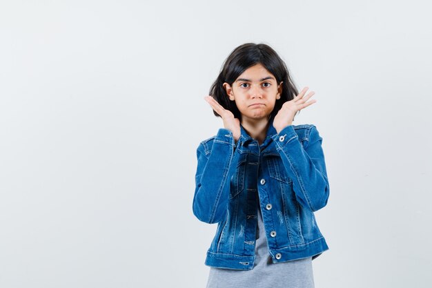 Expressive young girl posing