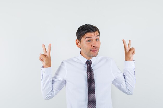 Expressive young guy posing in the studio