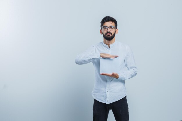 Expressive young guy posing in the studio