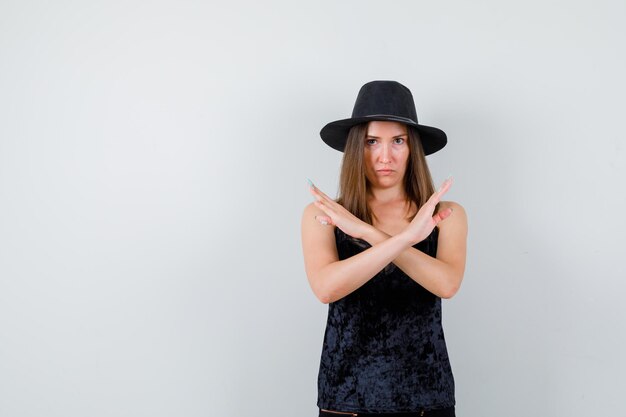 Expressive young lady posing in the studio