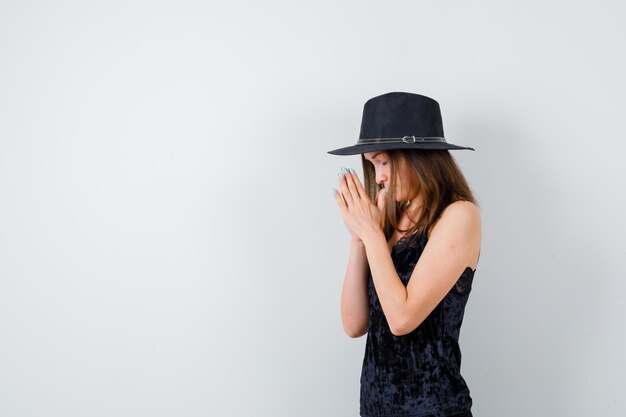 Expressive young lady posing in the studio