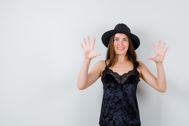 Expressive young lady posing in the studio