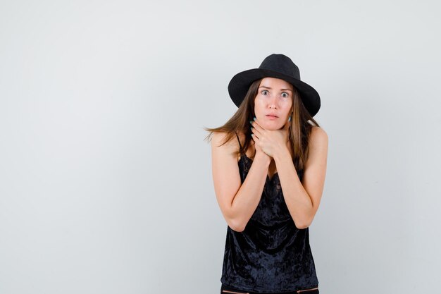 Expressive young lady posing in the studio