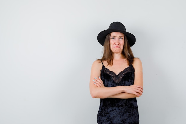 Expressive young lady posing in the studio