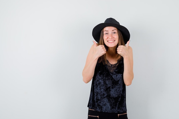 Expressive young lady posing in the studio