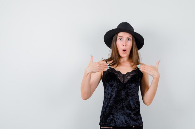 Expressive young lady posing in the studio