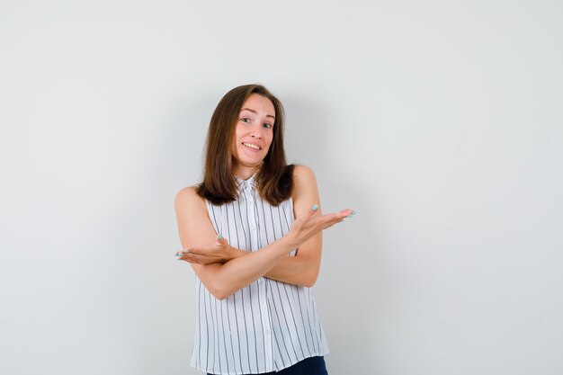 Expressive young lady posing in the studio