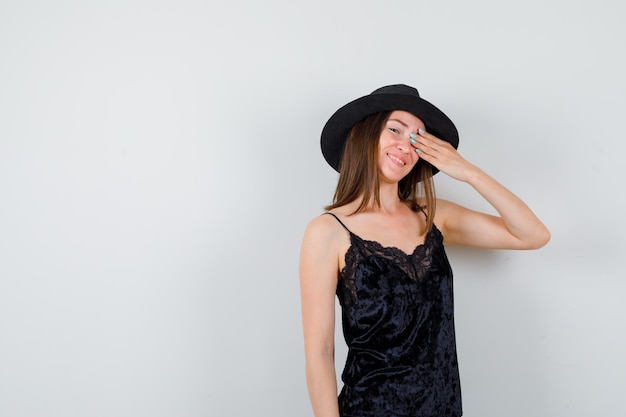 Expressive young lady posing in the studio