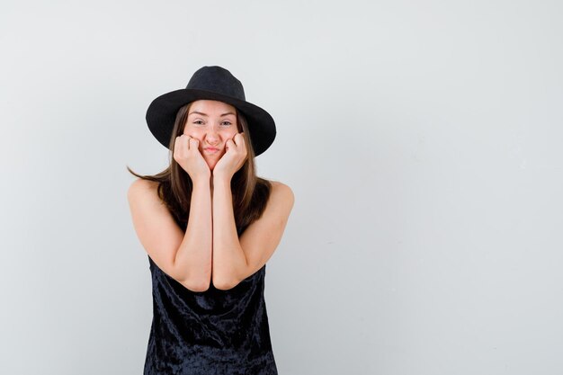 Expressive young lady posing in the studio