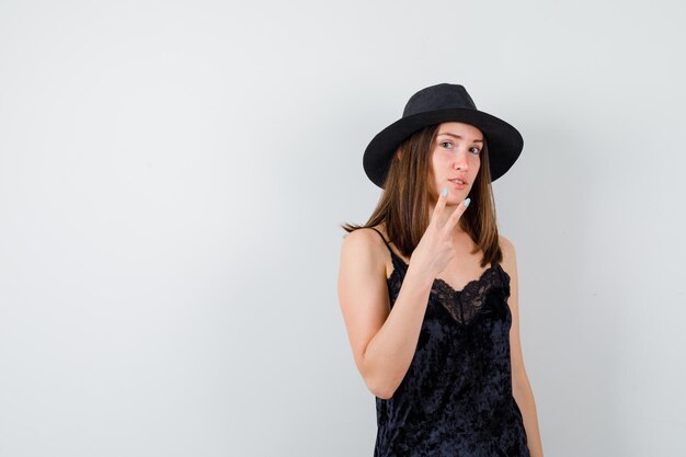 Expressive young lady posing in the studio