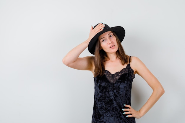 Expressive young lady posing in the studio