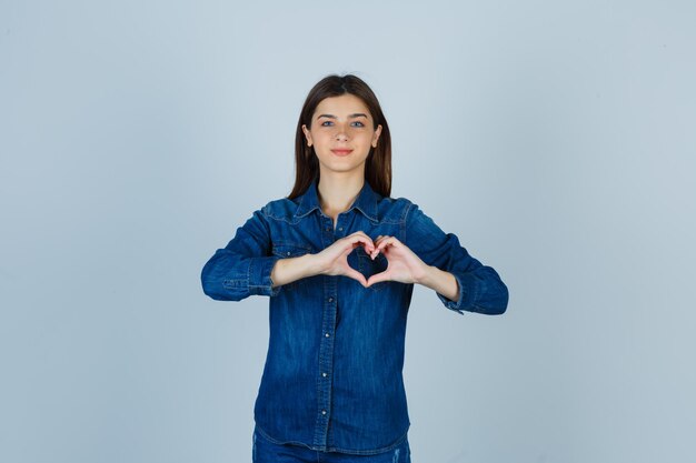 Expressive young lady posing in the studio