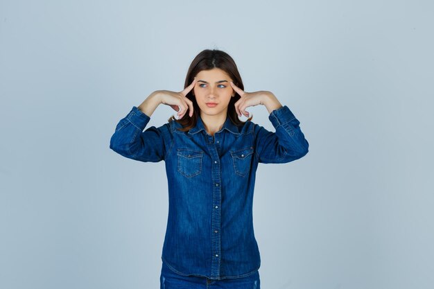 Expressive young lady posing in the studio