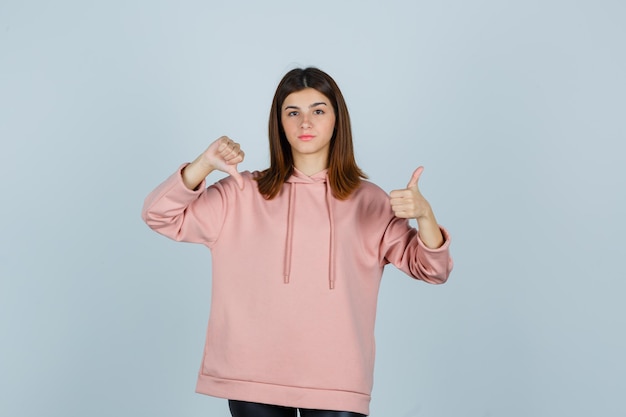 Expressive young lady posing in the studio