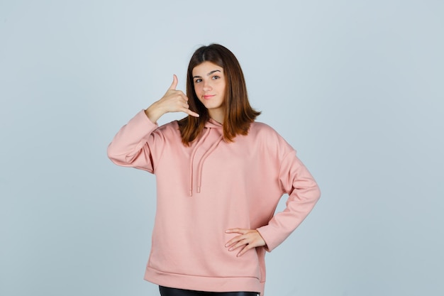 Expressive young lady posing in the studio