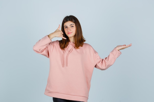 Expressive young lady posing in the studio