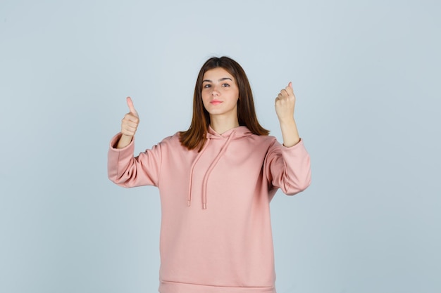 Expressive young lady posing in the studio