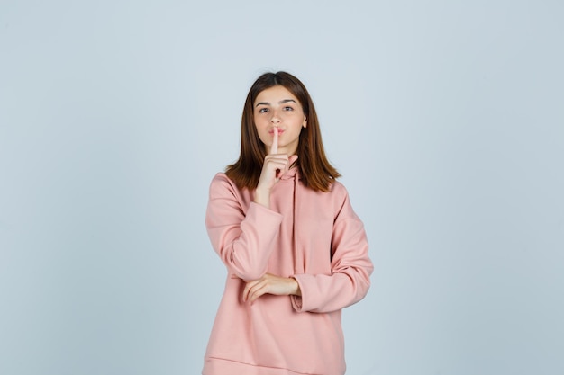 Expressive young lady posing in the studio