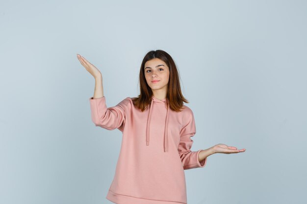 Expressive young lady posing in the studio