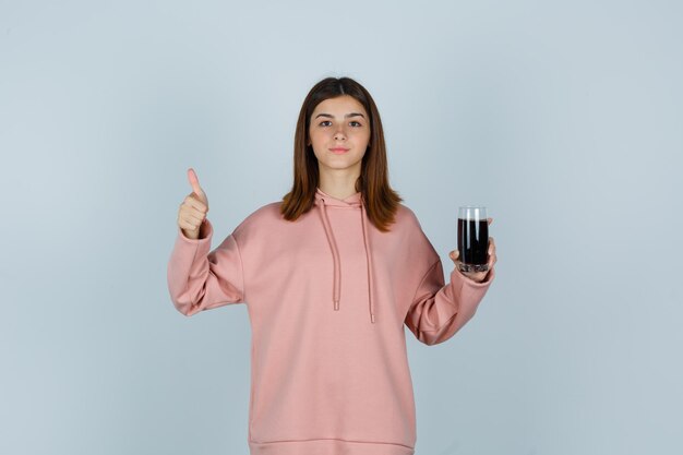 Expressive young lady posing in the studio