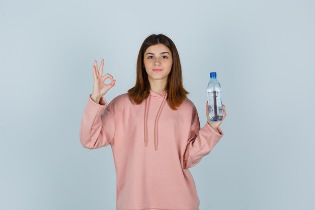 Expressive young lady posing in the studio