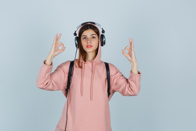 Expressive young lady posing in the studio