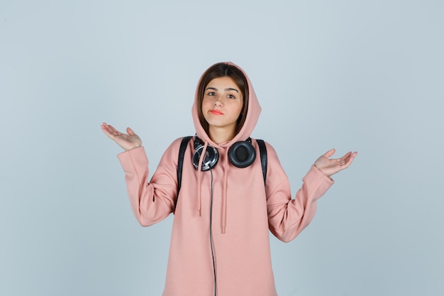 Expressive young lady posing in the studio