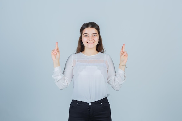 Expressive young lady posing in the studio