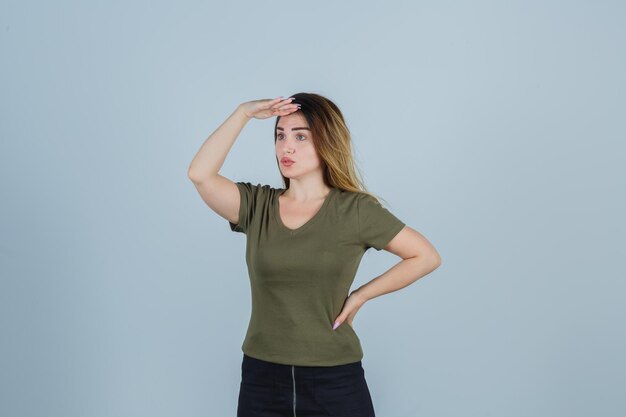 Expressive young lady posing in the studio