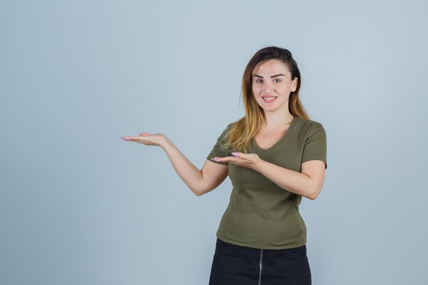 Expressive young lady posing in the studio