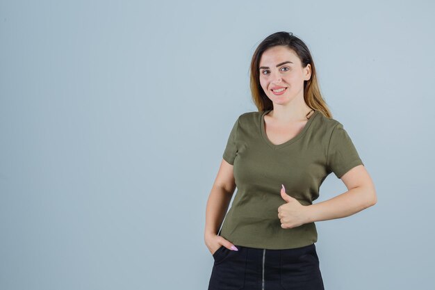 Expressive young lady posing in the studio