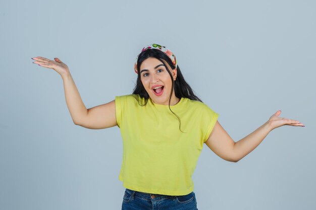 Expressive young lady posing in the studio