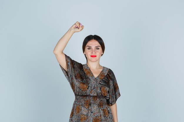 Expressive young lady posing in the studio