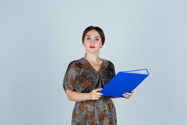 Expressive young lady posing in the studio