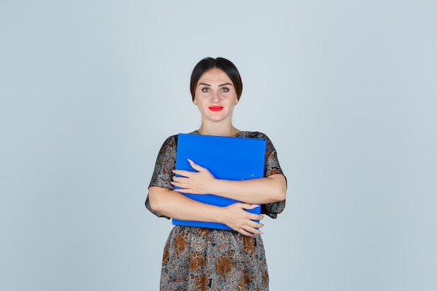 Expressive young lady posing in the studio