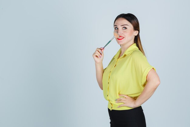 Expressive young lady posing in the studio