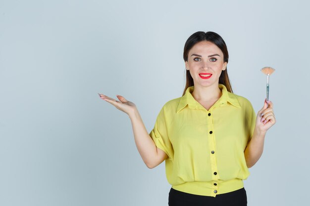 Expressive young lady posing in the studio