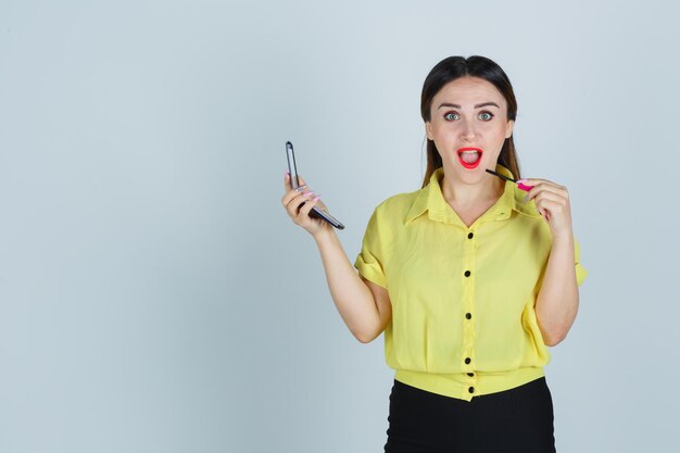 Expressive young lady posing in the studio